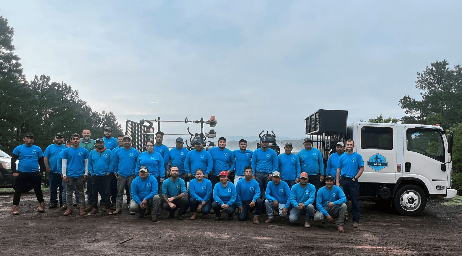ALM Birmingham crew with a company truck